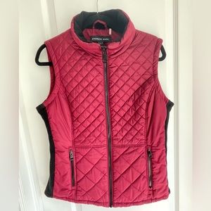 Burgundy, medium,  quilted vest with black lining and black zippers.
